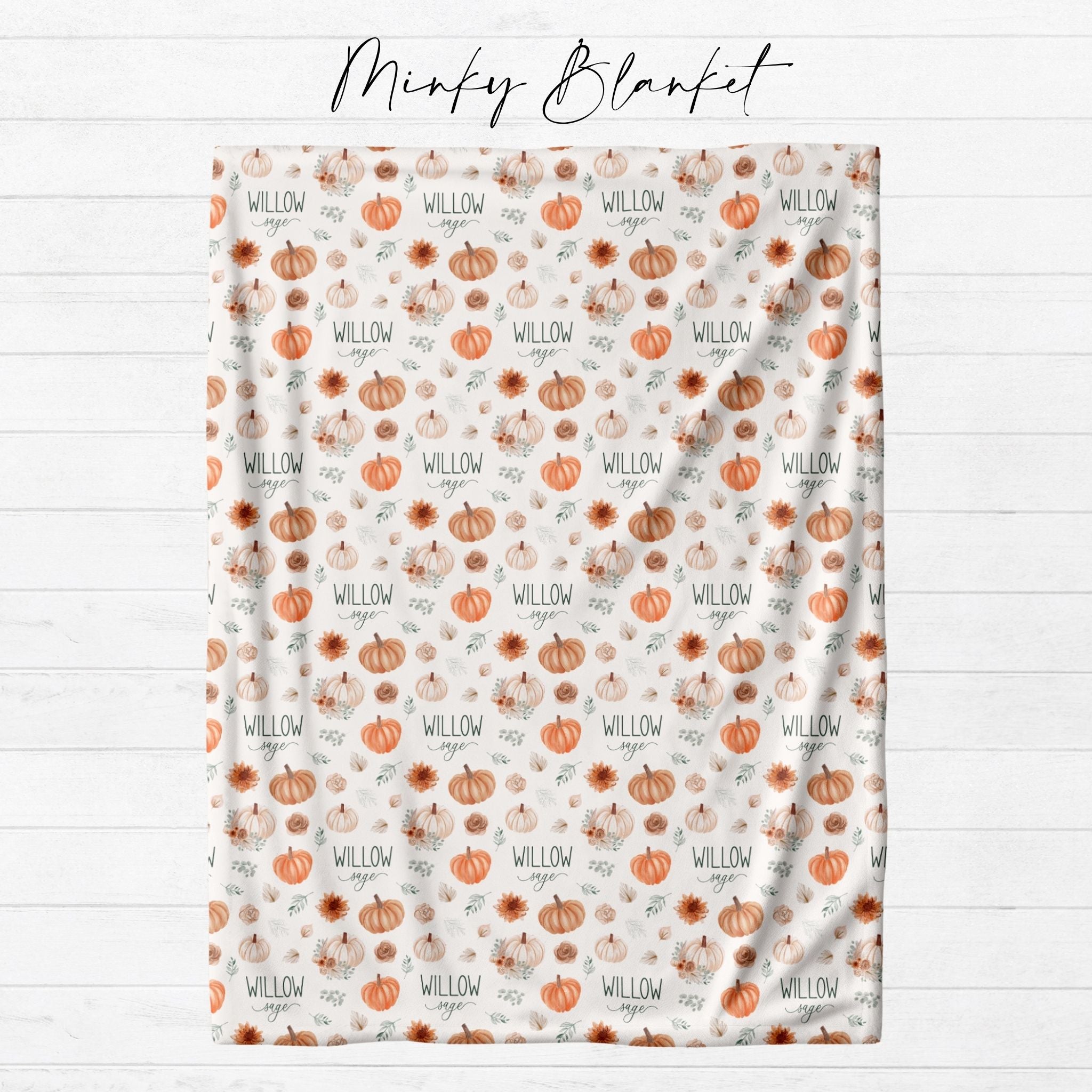 Personalized fall pumpkin minky blanket laid flat showing full watercolor pumpkin and autumn floral repeat pattern with custom name from Twinklette